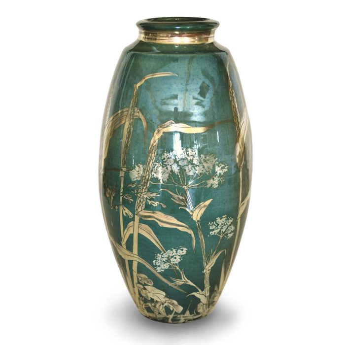 Slim vase with cow parsley and grasses. Blue-green ground. Height 28 cm. Unique number 8010.