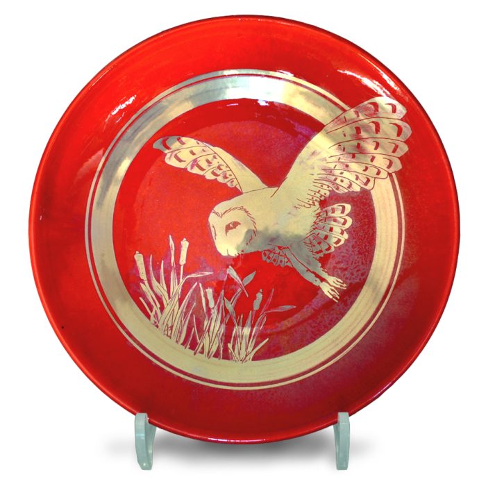Swooping owl plate. Red ground. Diameter 23 cm. Unique number KB121.