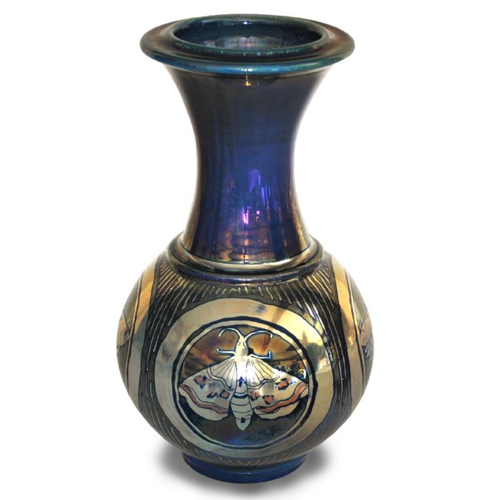 Moth motif. Slim necked vase. Dynamic blue ground. Height 22cm. Unique number KB149.