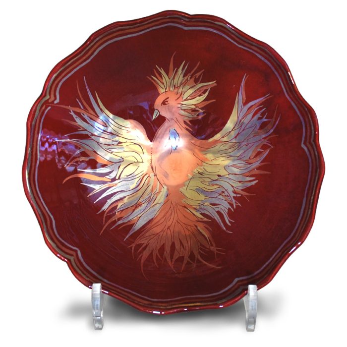 Phoenix bowl. Red-burgundy ground. Diameter 20.5cm. Unique number KB132.